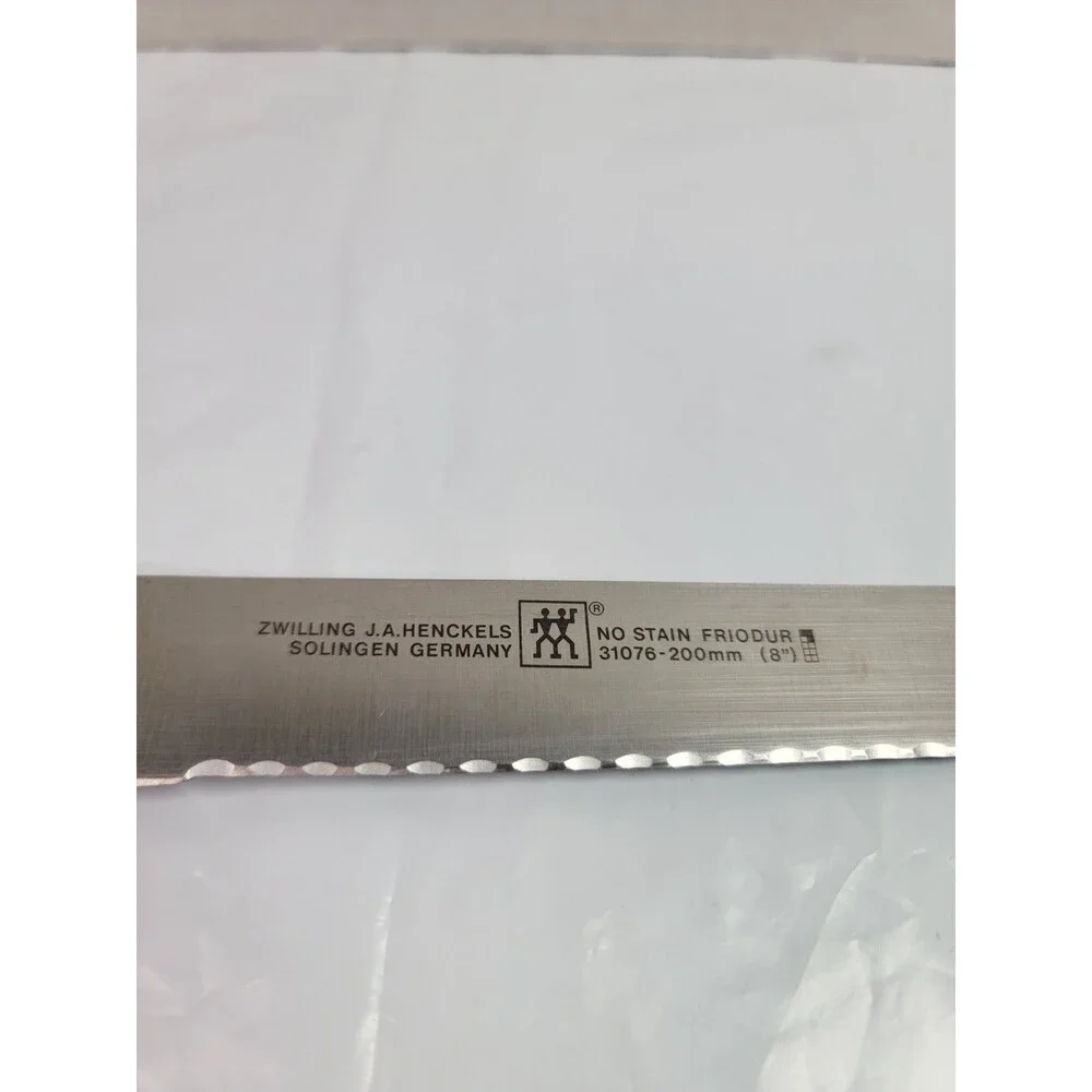 Zwilling J.A. Henckels Four Star 8” Serrated Bread Knife 31076-200 Germany